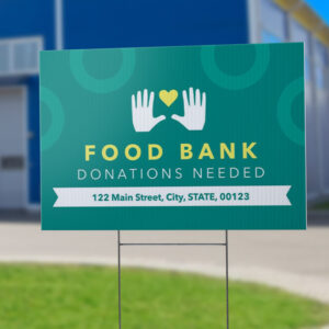 A sign that says food bank donations needed.